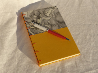 Lined notebook, criss-cross technique, yellow