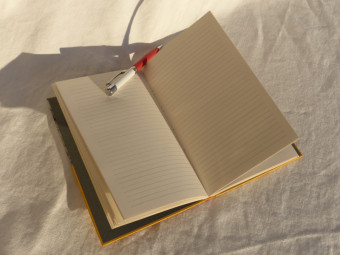 Lined notebook, criss-cross technique, yellow