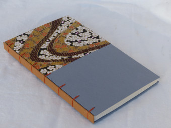 Lined notebook, criss-cross technique, grey