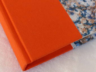 Cahier à ligne à lacet, toile orange