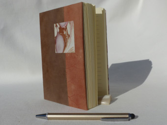 Cahier à ligne dos parchemin marron vieux rose