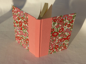 Pink cloth bound notebook
