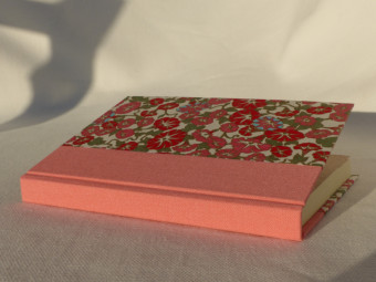 Pink cloth bound notebook