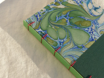 Lined notebook, criss-cross technique, green