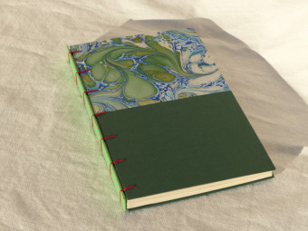 Lined notebook, criss-cross technique, green