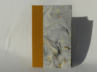 Petit carnet en toile ocre