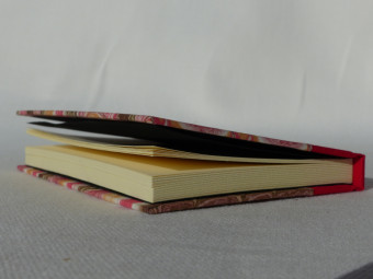 Small cloth notebook red